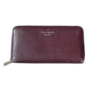 Kate Spade New York Zip Around Continental Wallet Burgundy Pebbled Leather Logo